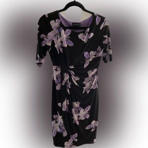 Like new 4p black dress with flower detail